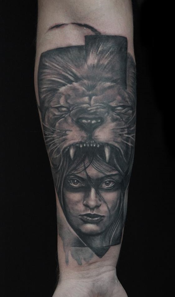 Black And Grey Reallistic Lion Tattoo