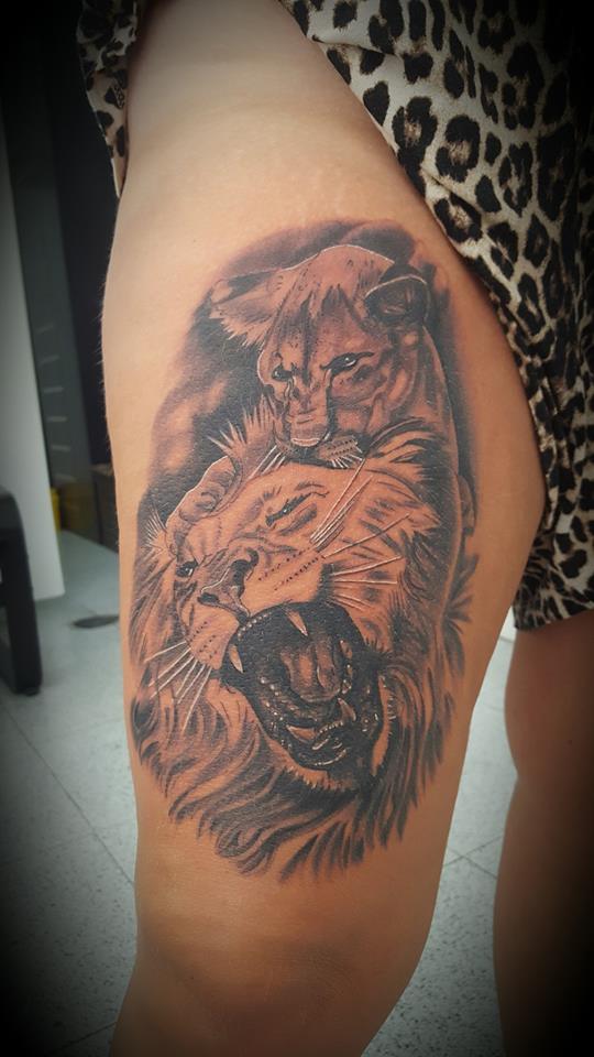 Fighting Lions On Thigh