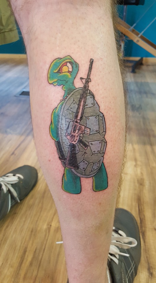 Fun Battle Ridden Turtle Tattoo