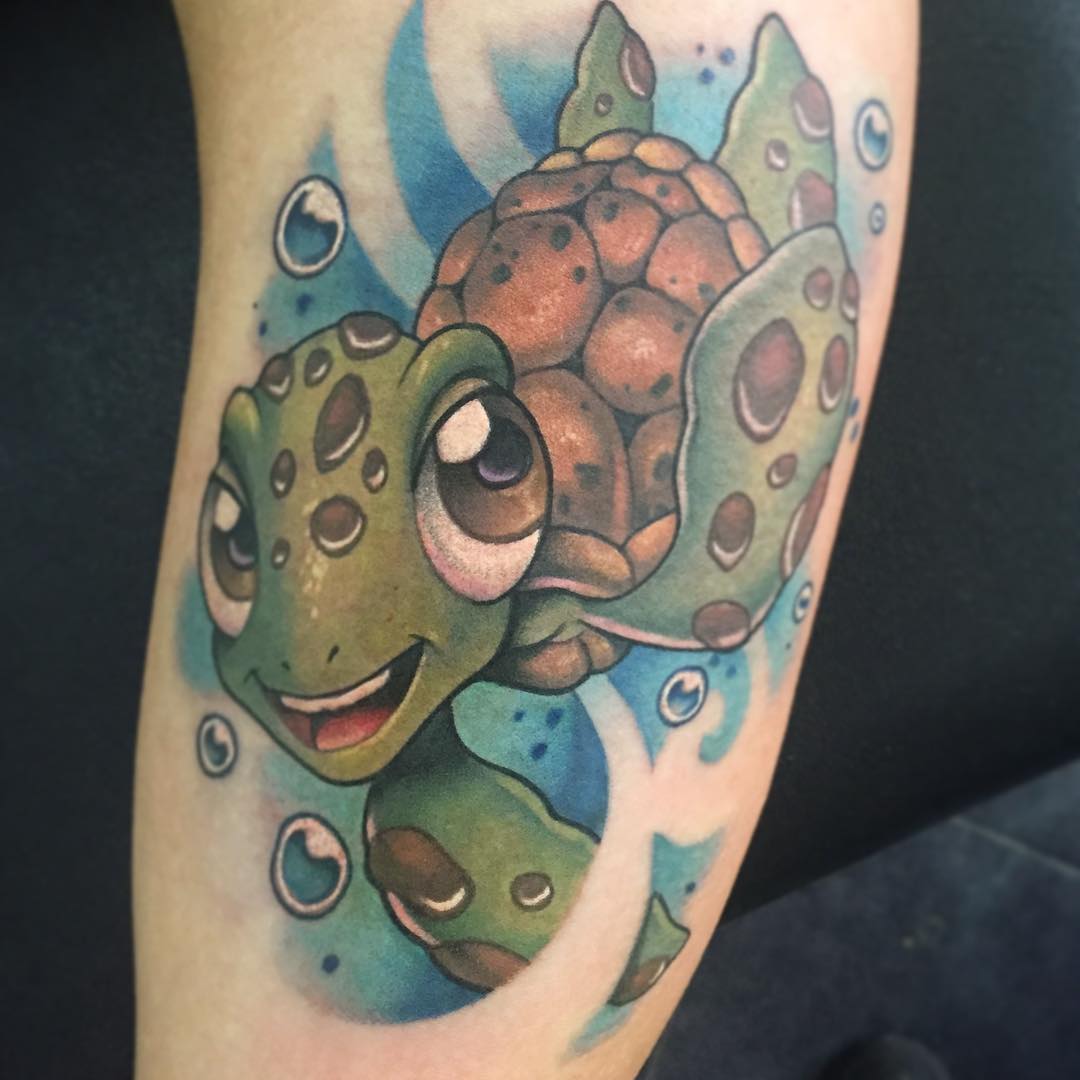 Happy Turtle Tattoo On Lower Armm