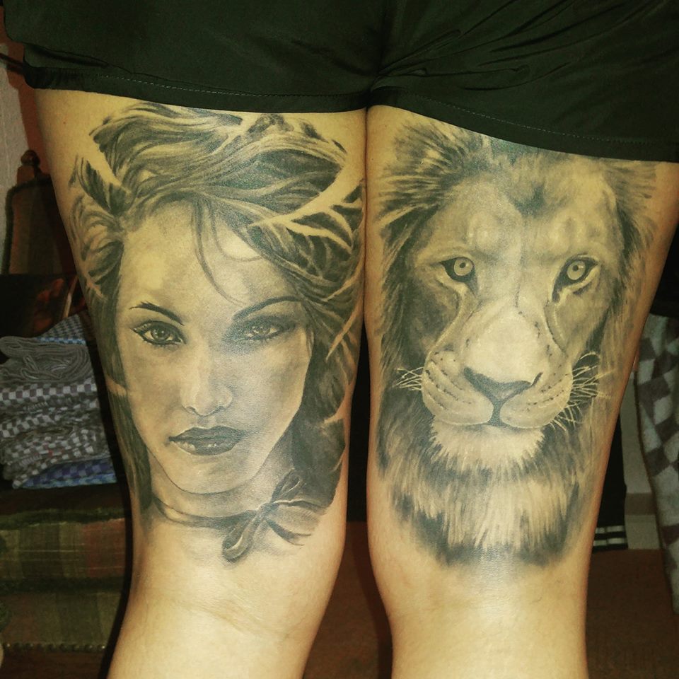 Lion Tattoo On One Thigh And Women On Another