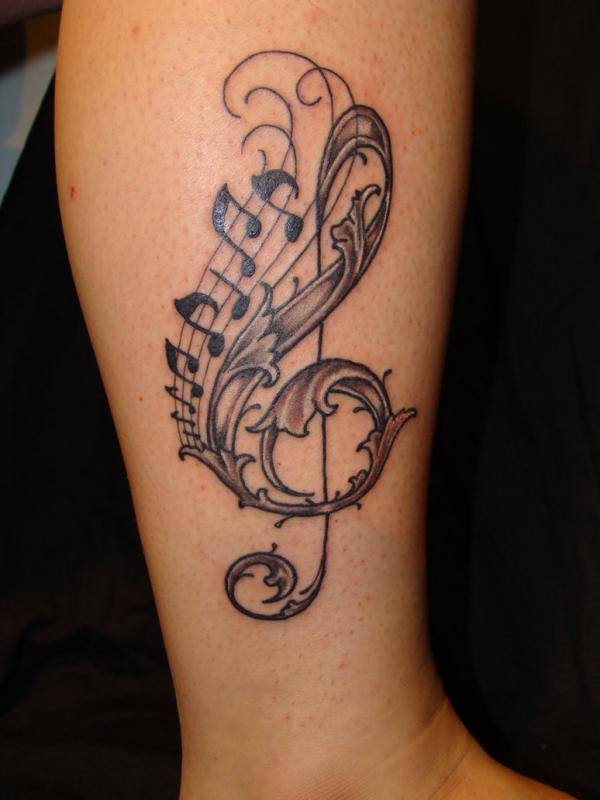 Musical Tattoo On Sleeve