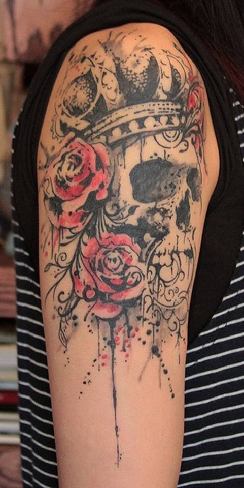 Skull And Flower Tattoo On Arm