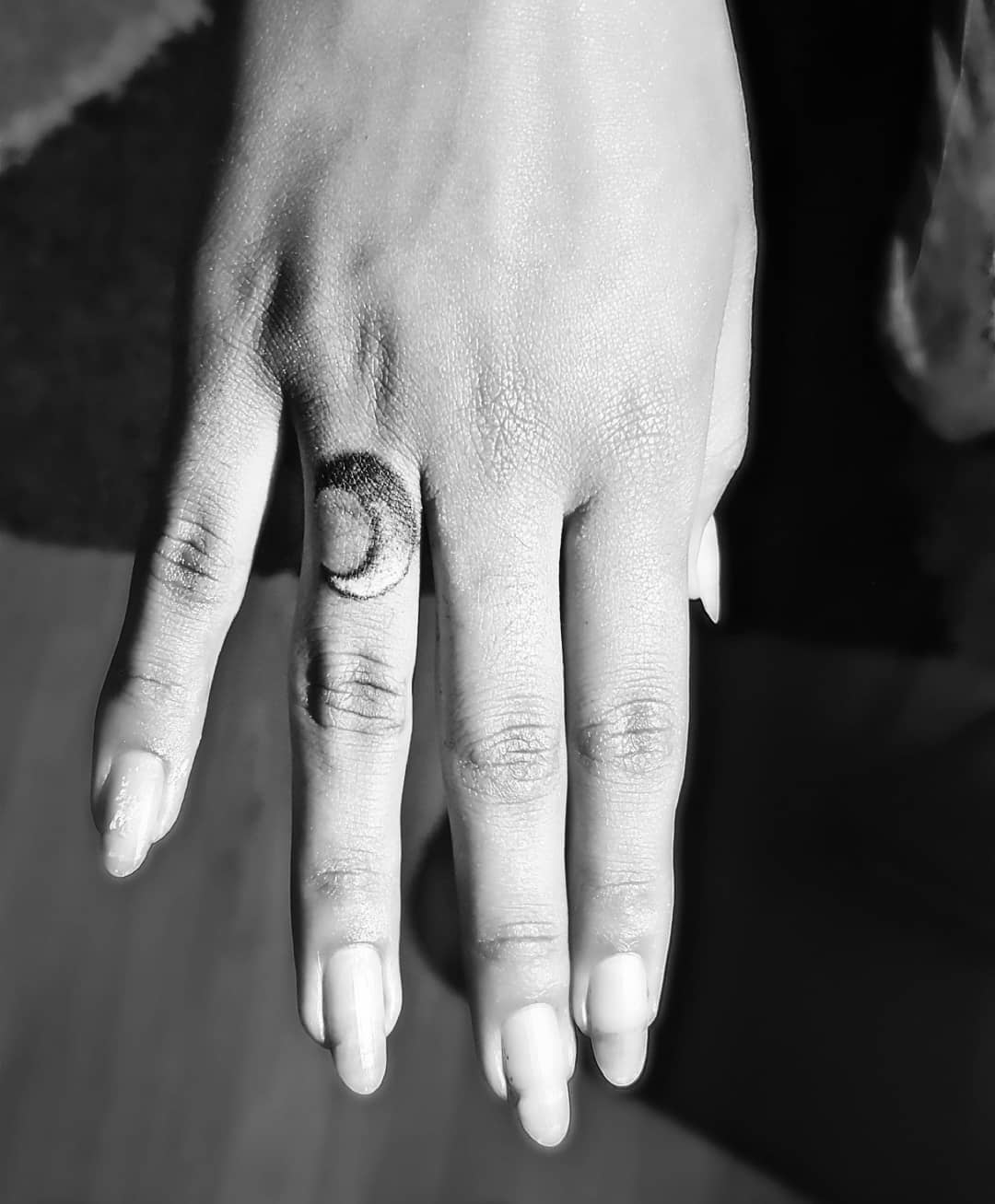 Tiny Moon Tattoo On Finger
