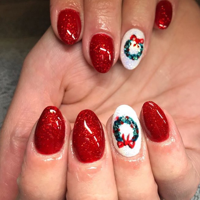 Bright red gel nails with wreath. Pic by scratchmagazine