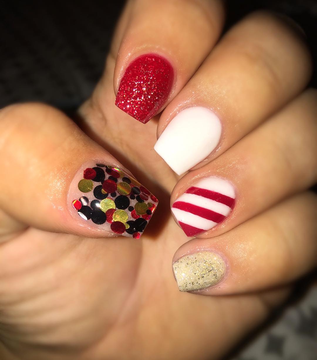 Classic red and white nails with sparkles. Pic by glambyiizana
