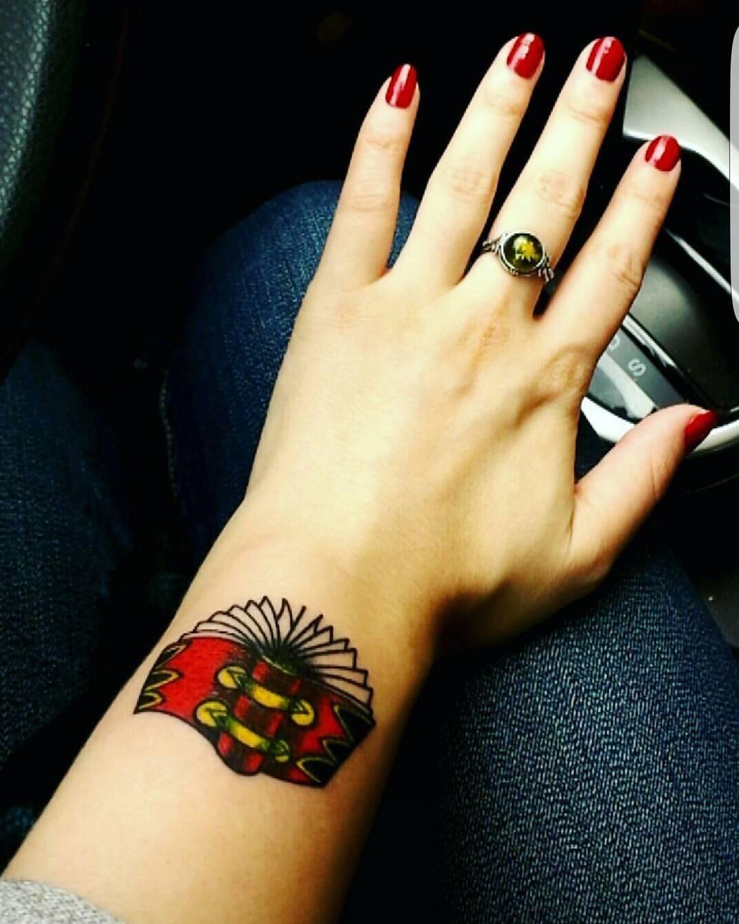 Colored Book Tattoo On Hand