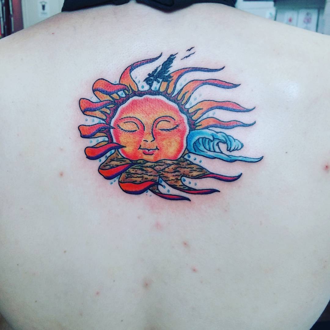 Colored Sun Feminine Tattoo On Back