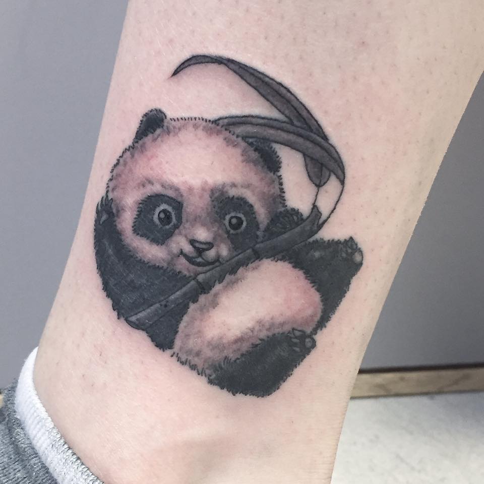 Cute Black Panda On Arm