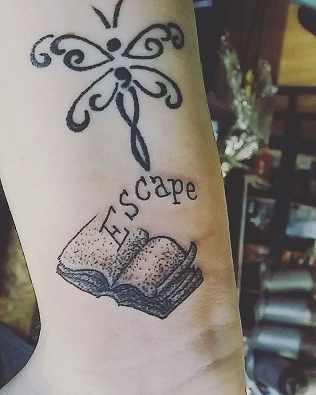 Cute Book Tattoo On Wrist