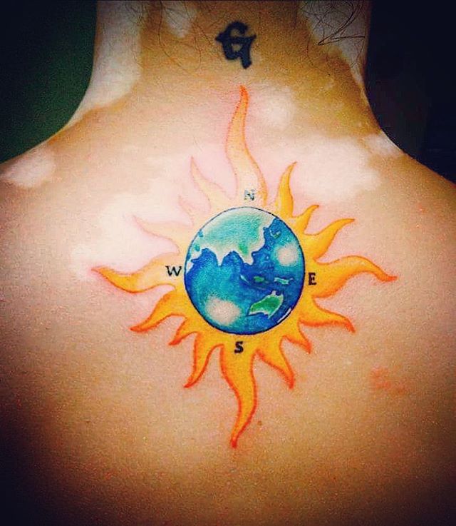Globe Sun Tattoo On Back