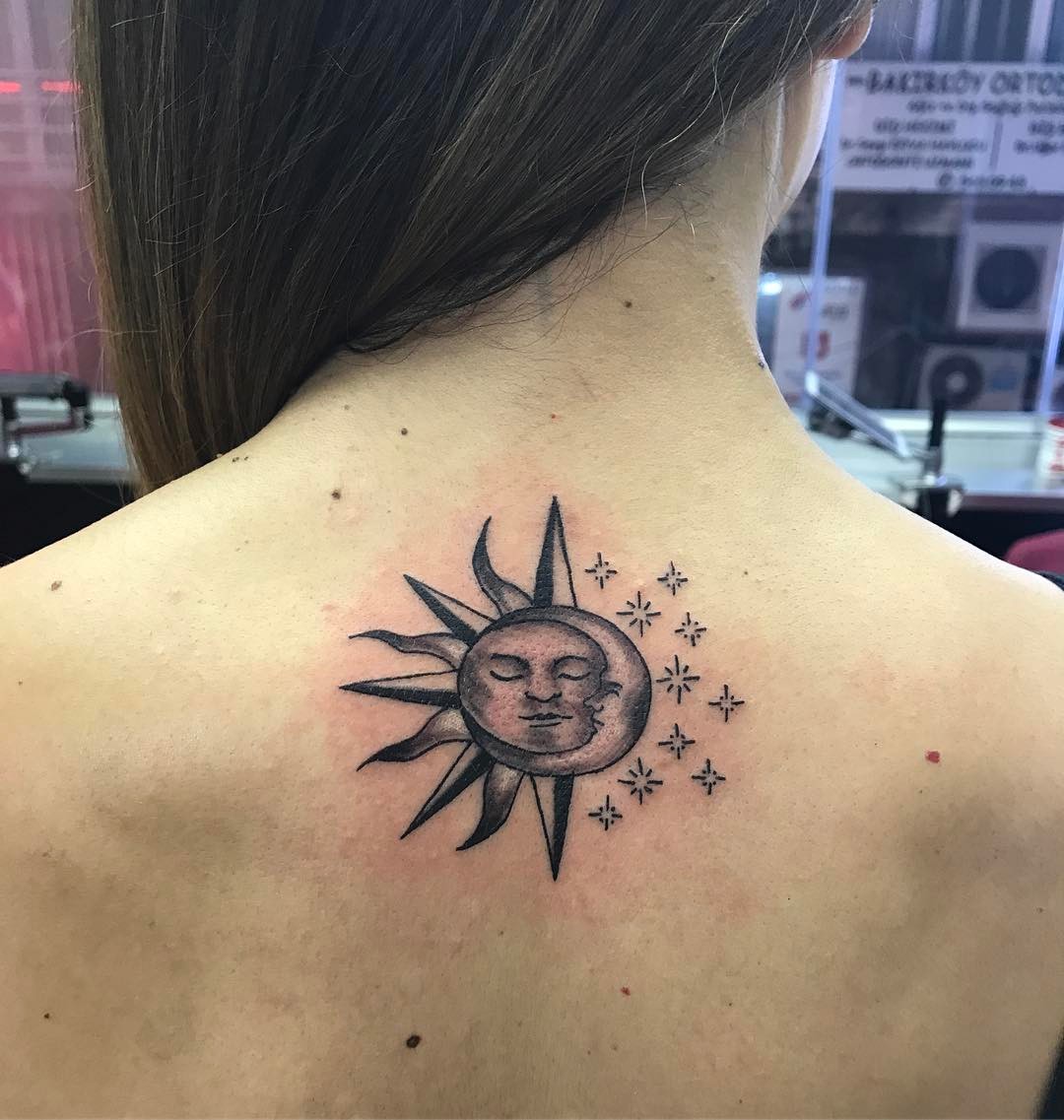 Happy Sun And Moon Tattoo On Back