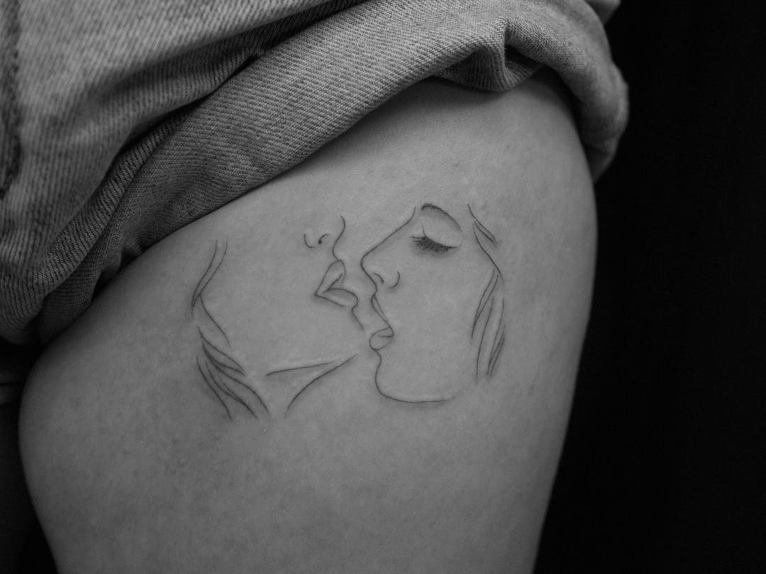 Kiss Tattoo On Thigh