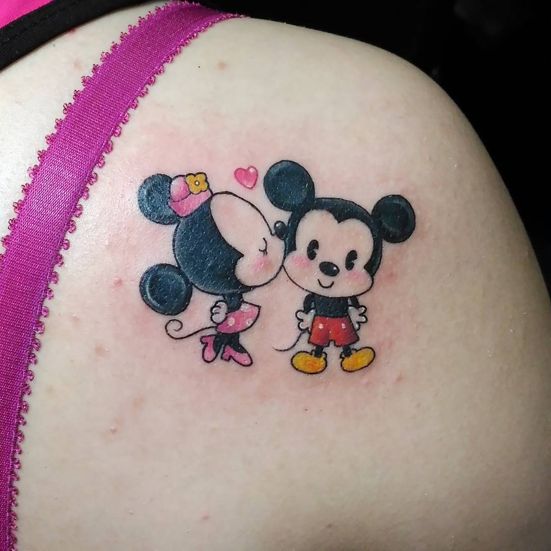 Mickey and Minnie Mouse on Shoulder