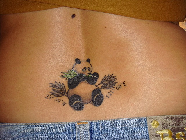 Panda Bear Eating Bamboo Leaves Tattoo on Lower Back