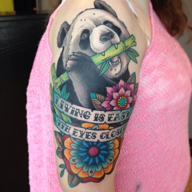 Panda Bear With Flower Tattoo On Arm