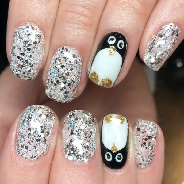 Penguin on silver nails. Pic by emmalouisenailsbeauty