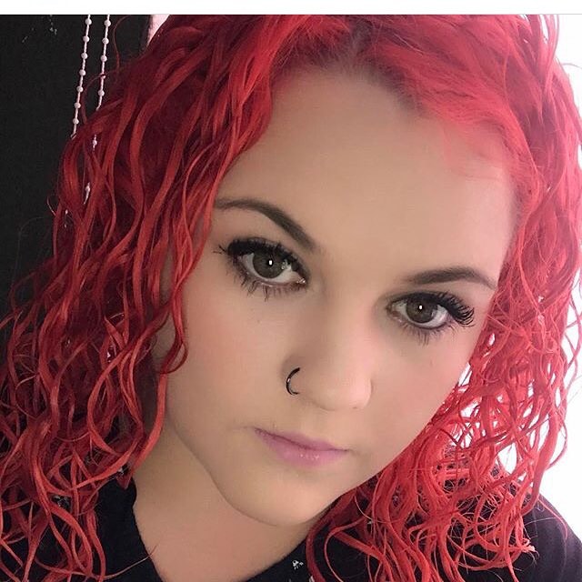 Pinkish Red Curly Hairs