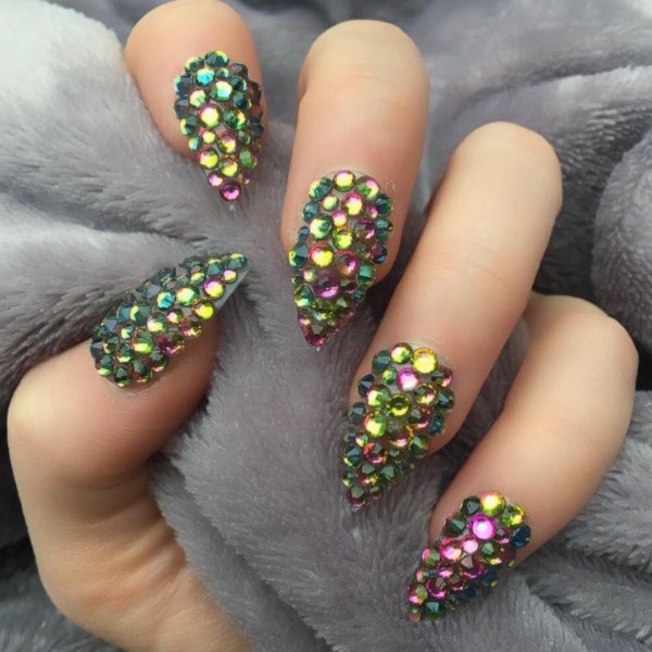 Rainbow pointy nails with crystals. Pic by doobysnails