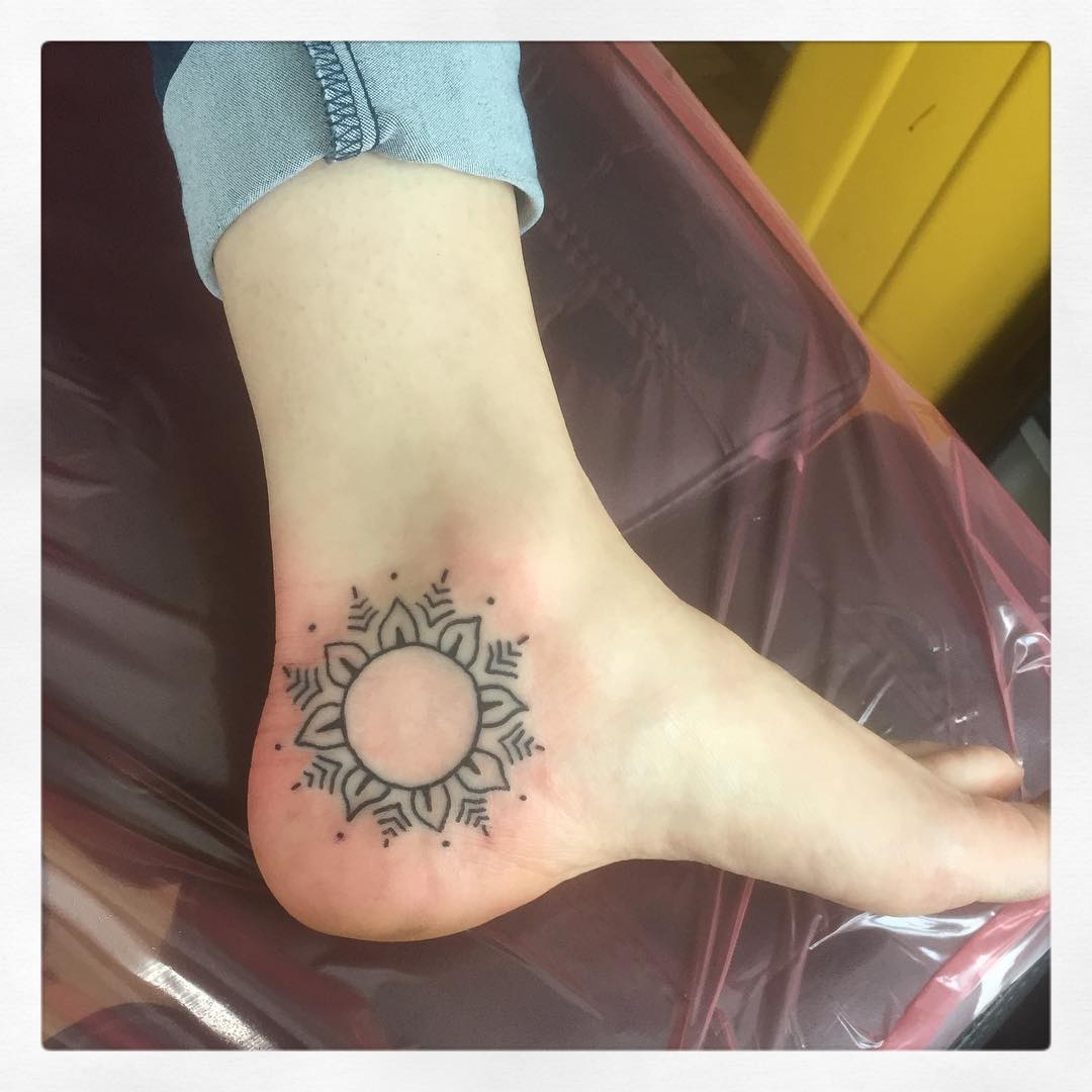 Simple Sun Tattoo On Ankle