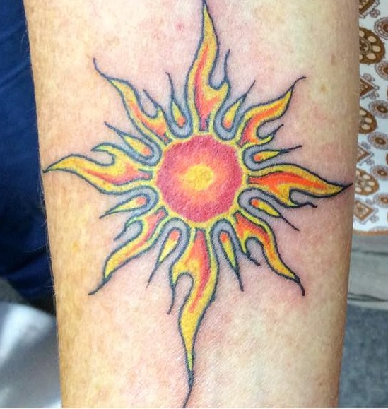 Sun Tattoo Inked On Arm