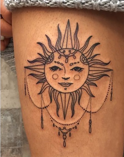 Sun Tattoo On Right Thigh