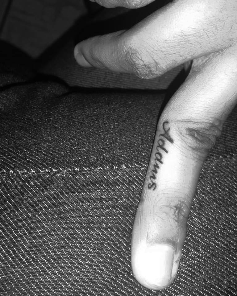 Adams Finger Tattoo
