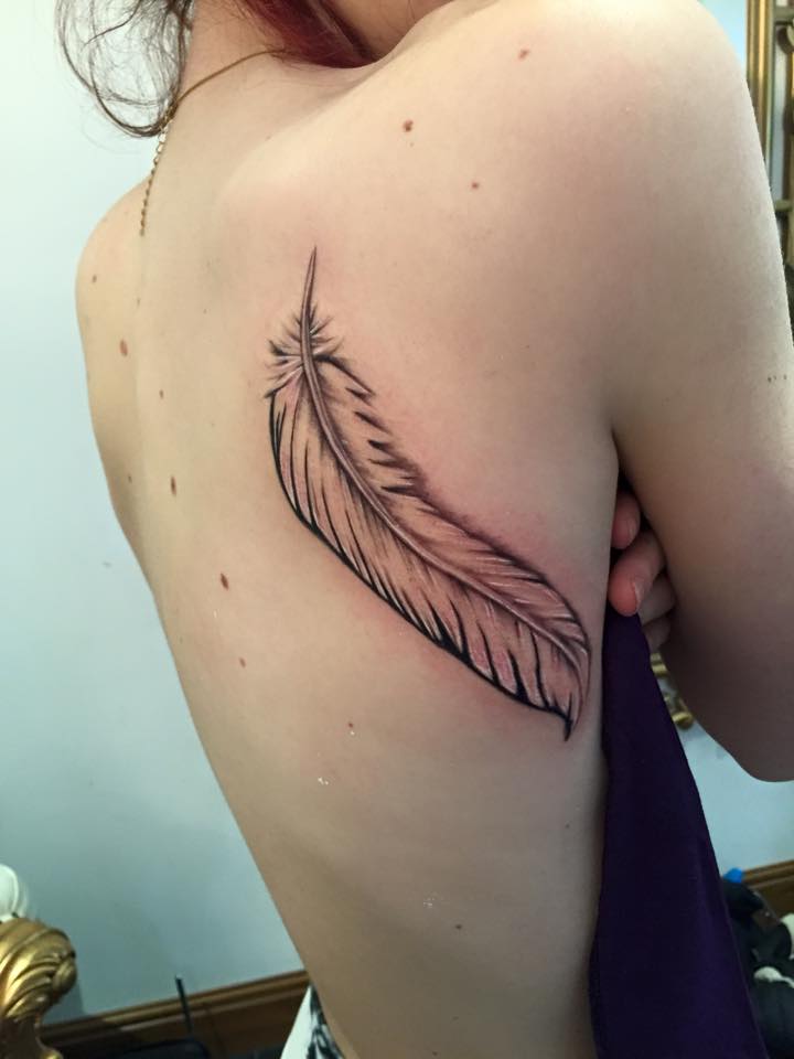 Awesome White Feather Tattoo