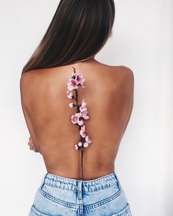 Back Is Decorated With Flower
