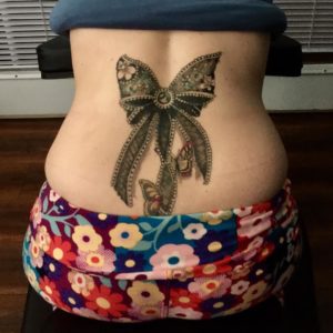 Beautiful Lace Bow Lower Back Tattoo