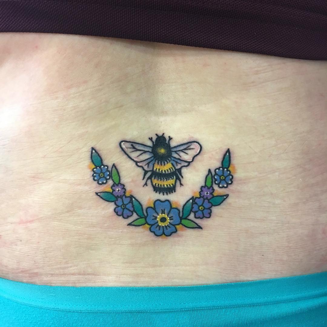 Bee With Flowers Lower Back Tattoo