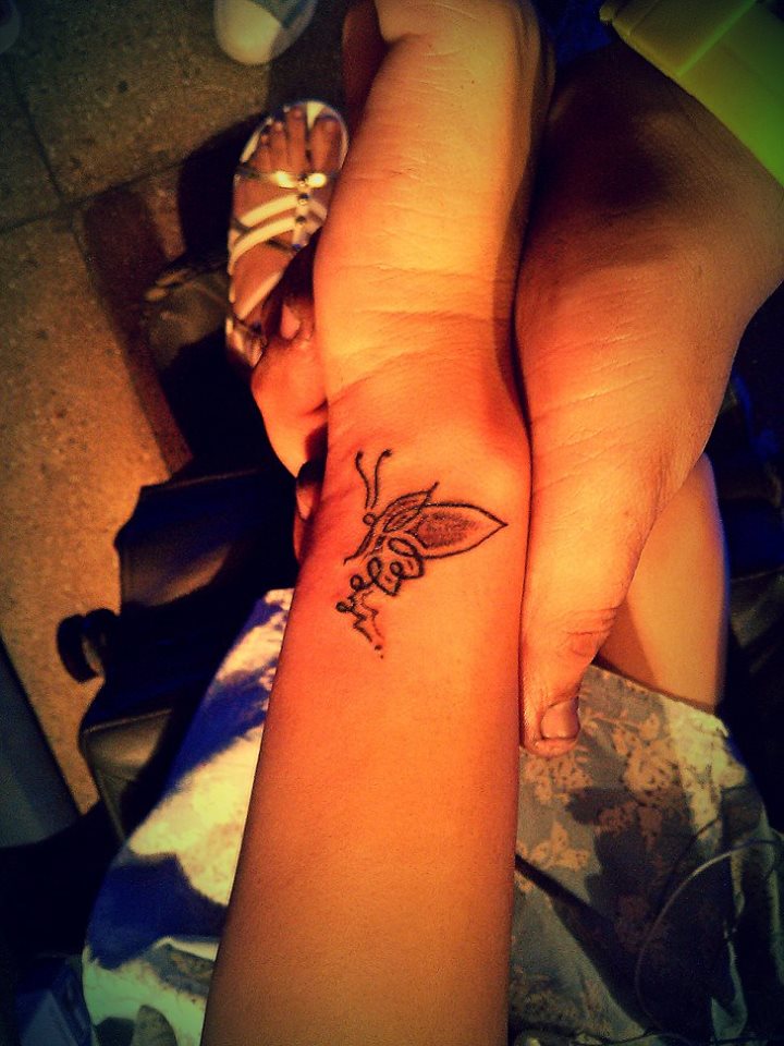 Butterfly Inked On Back Wrist