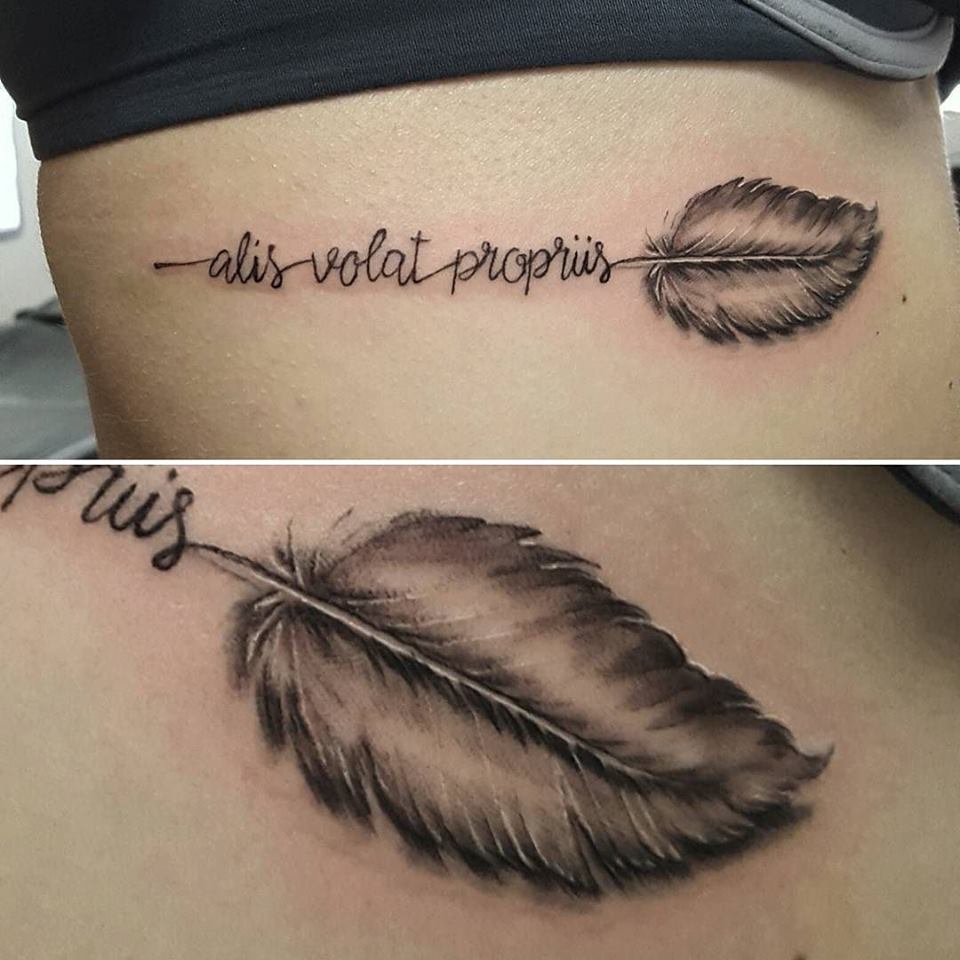 Chic Feather On Ribs