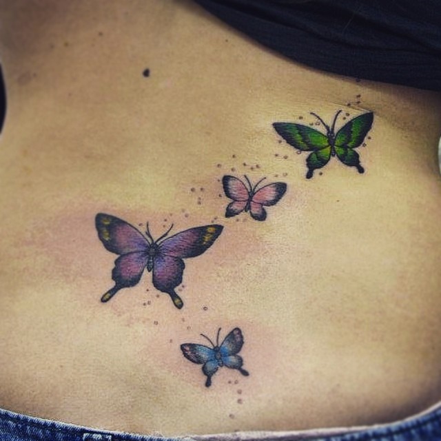 Colored Butterfly Lower Back Tattoo