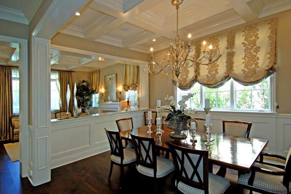 Contemporary Dining Space With A Glamorous Chandelie