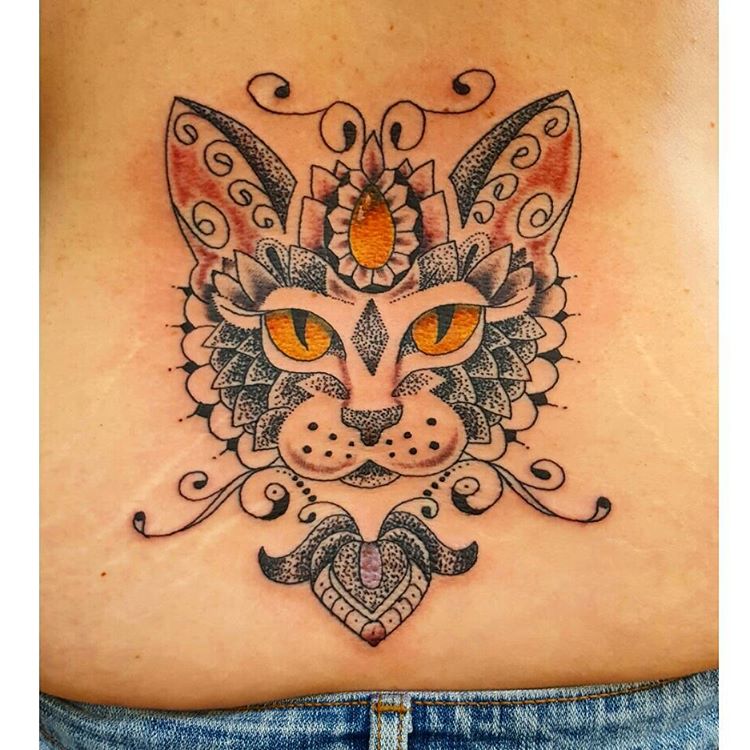 Dot Work Cat Lower Back Tattoo