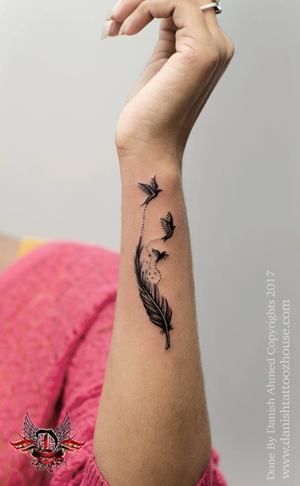 Feather With Birds On Wrist
