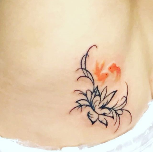 Goldfish Lower Back Tattoo