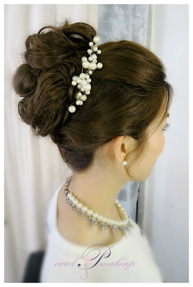 Gorgeous Bridal High Bun With Pearl Headpiece