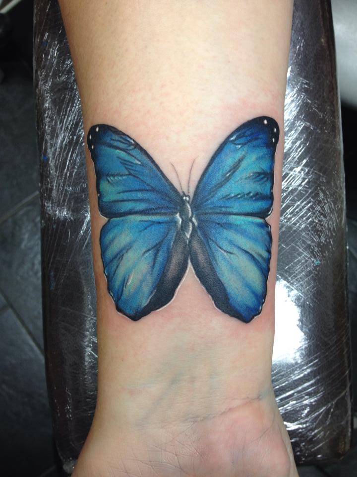 Gorgeous Sky Blue Butterfly Tattoo