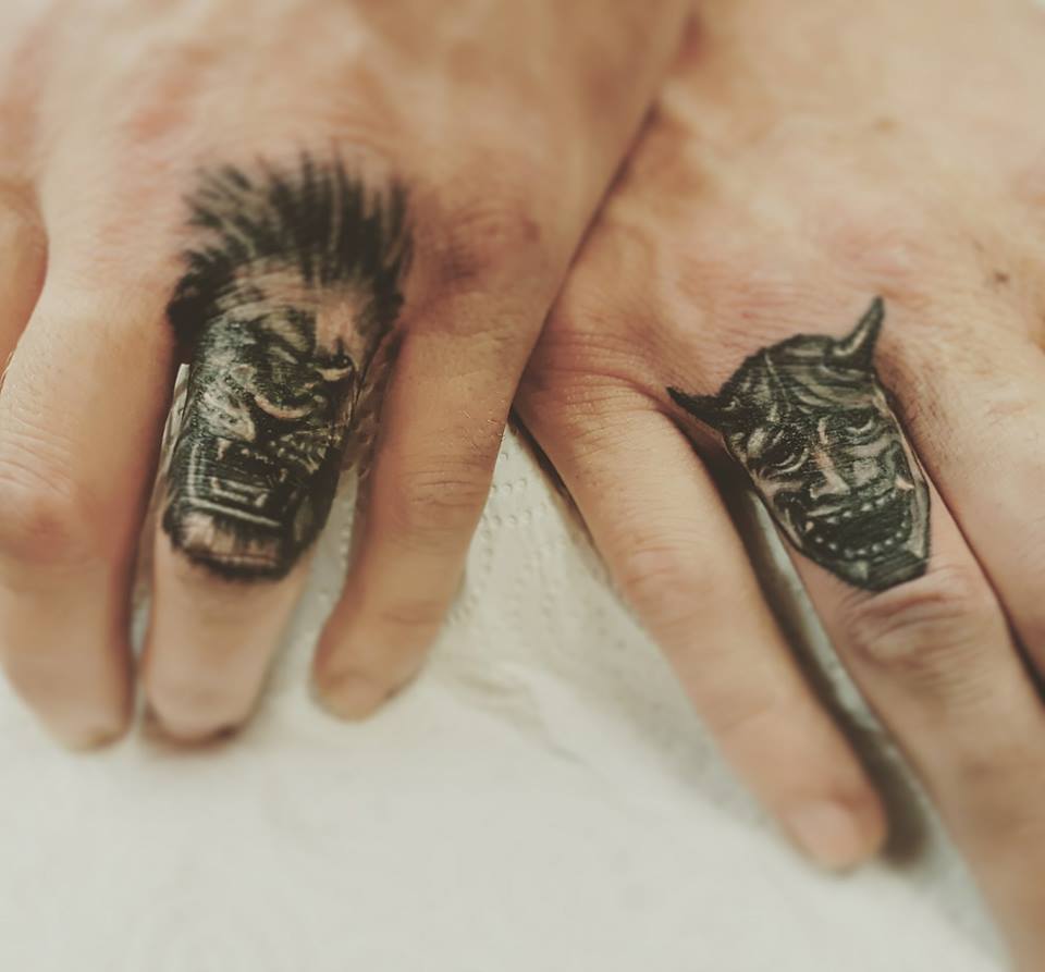Horory Finger Tattoo