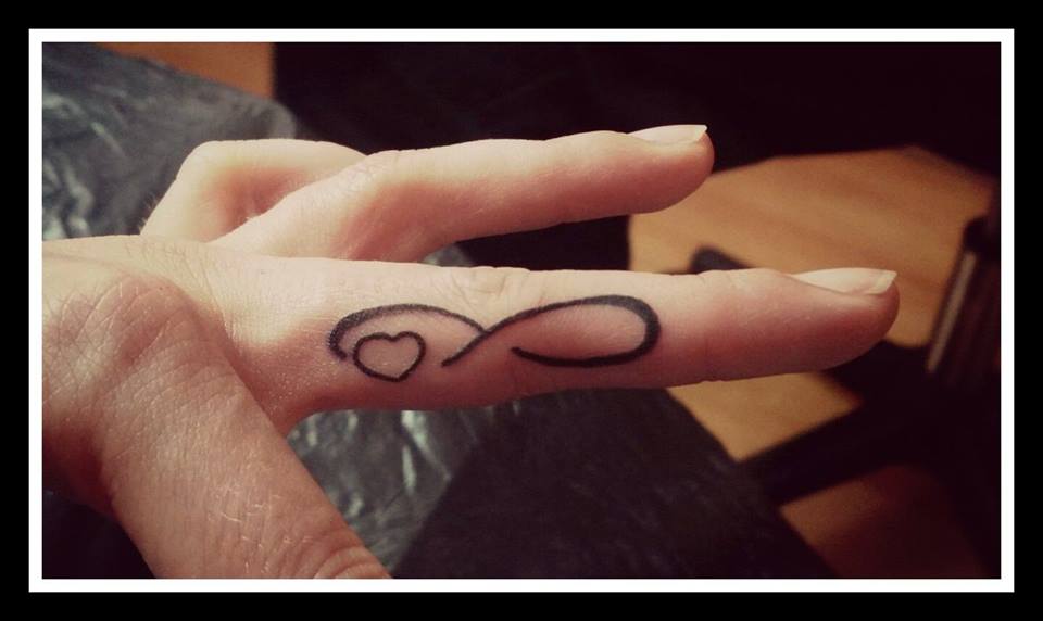 Infinity With Heart Finger Tattoo