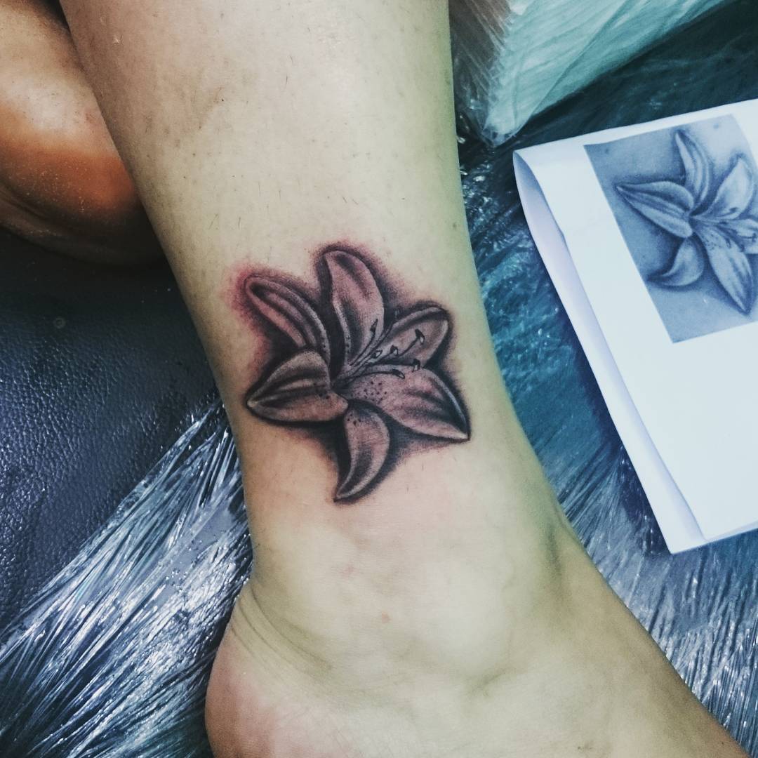 Liliy Flower Tattoo On Ankle