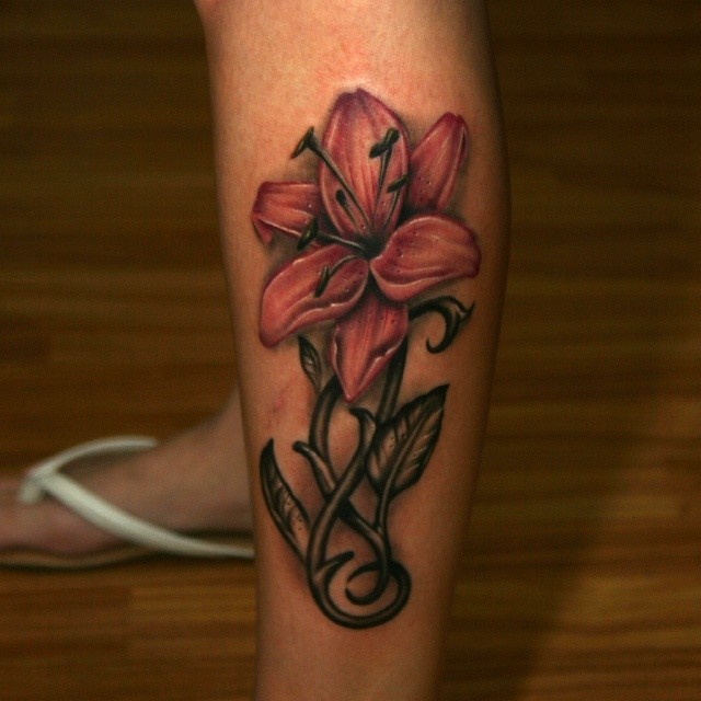 Lily Flower With Swirls Inked On Lower Leg