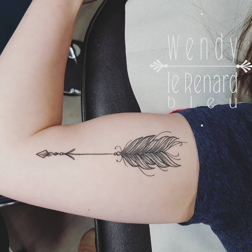 Line Work Feather Tattoo