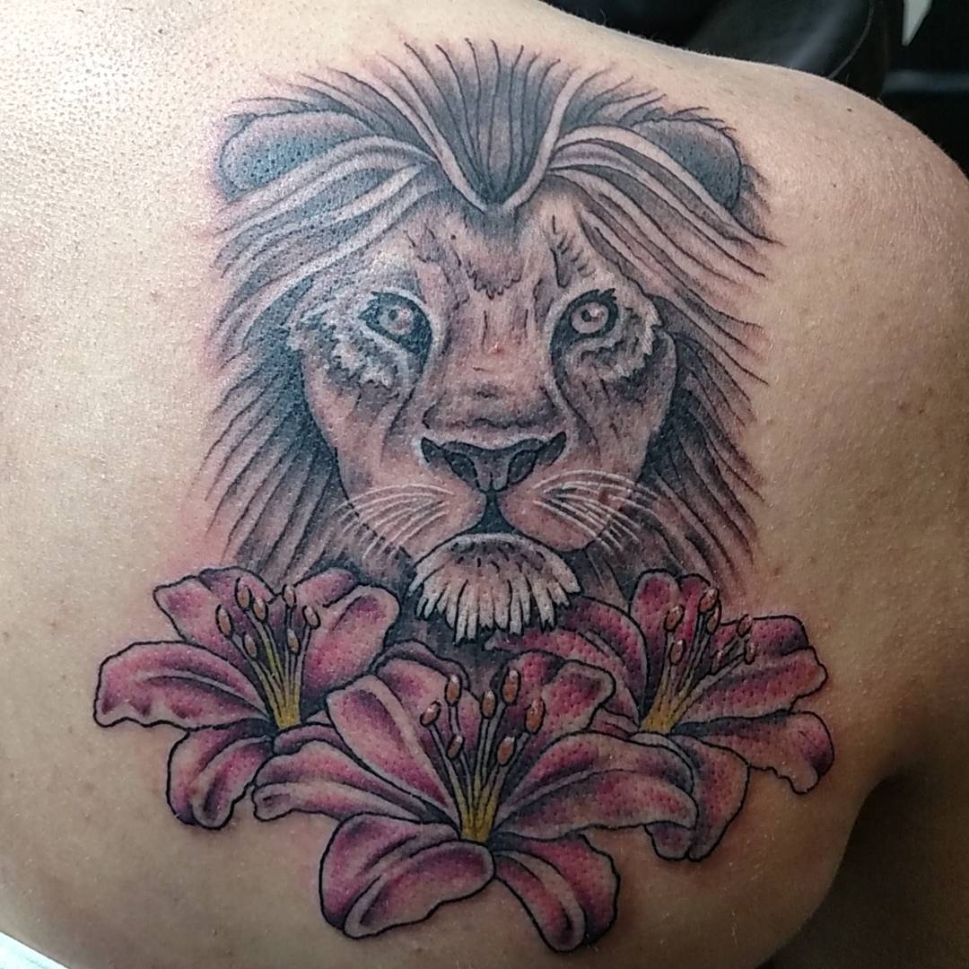 Lion With Pink Lilies On Back Shoulder