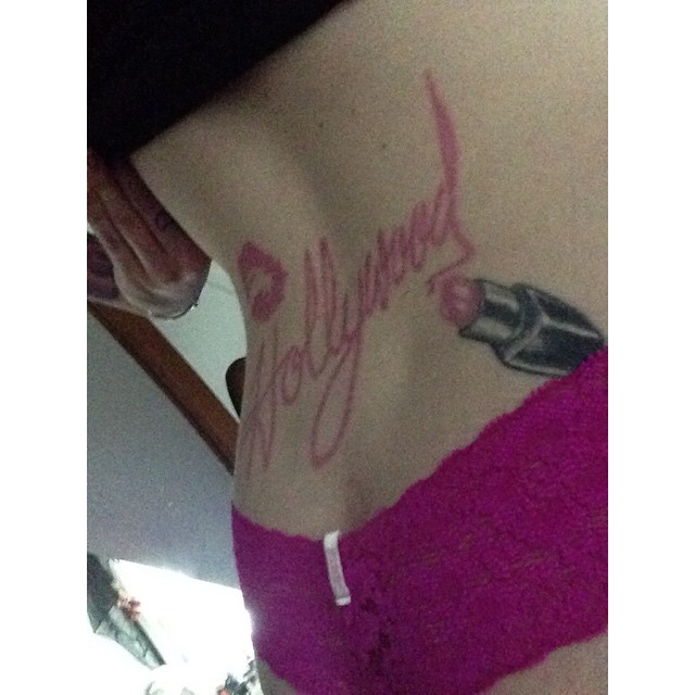 Lipstick With Lips Inked On Lower Back