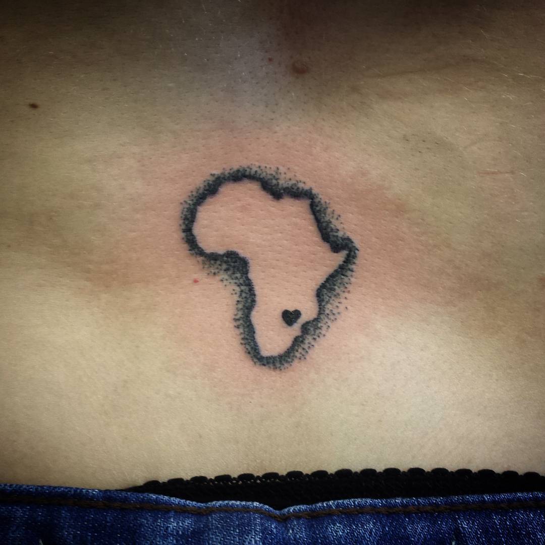 Map With Little Heart Lower Back Tattoo