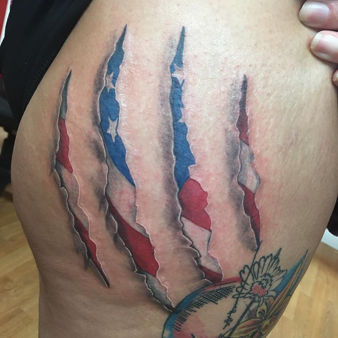 Ripped Skin Tattoo On Bump