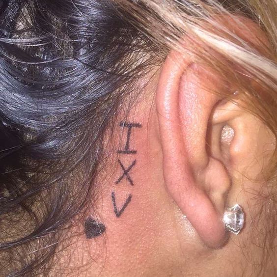 Roman Numeral Tattoo Behind The Ear Tattoo